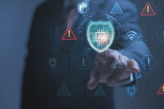 A businessman taps a glowing shield icon to activate an artificial intelligence cybersecurity system. High-tech security shields and warning triangles appear on a screen to show threat management.