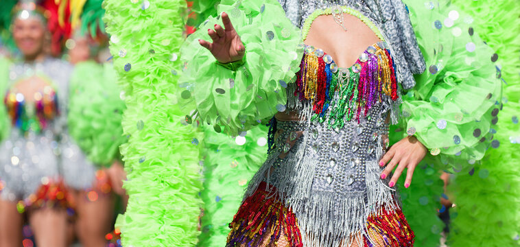 A woman in costume dancing on carnival, dancers during the carnival
