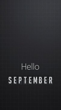 Minimalist dark background with the text Hello September for calendar or planner.