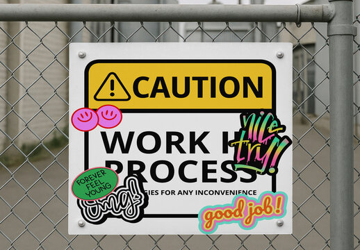 Fence With Caution Sign Mockup&nbsp;Featuring Colorful Sticker Designs&nbsp;PSD Format
