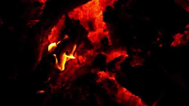 Fire fills foreground.
Embers create texture.
Flame reveals charcoal.
Glow defines darkness.