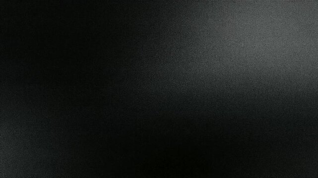 穏やかに流れるフィルムグレインの粒子背景
