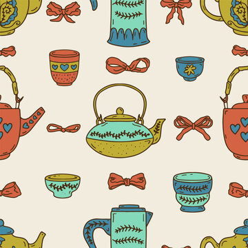 Colorful tea pots and cups doodle icons seamless pattern on beige background. Cozy rustic pottery line art wallpaper vector