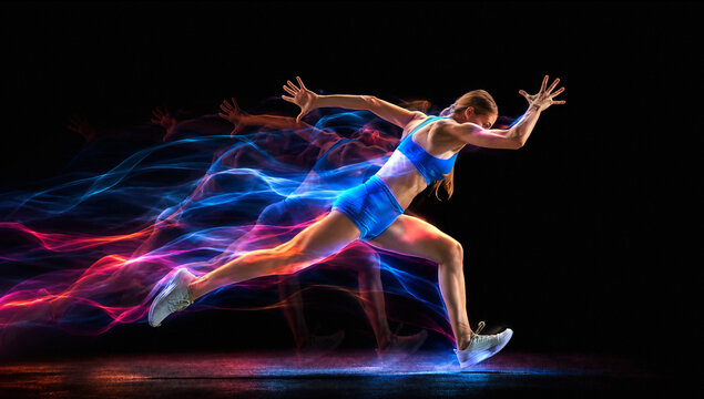 Female runner accelerates in powerful stride with flowing blue and pink energy trails. Concept of running apparel, fitness services and endurance coaching.
