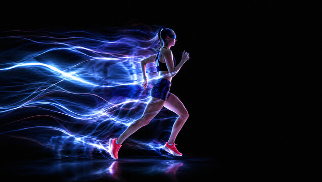 Female runner sprints with intense blue energy waves flowing behind her. Concept of running shoes, fitness coaching and race promotion.