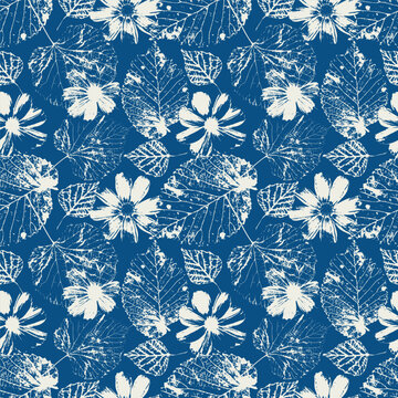 Botanical seamless pattern with blue cyanotype flower and leaves stamps. Monochrome grunge autumn nature background. Inky floral vector