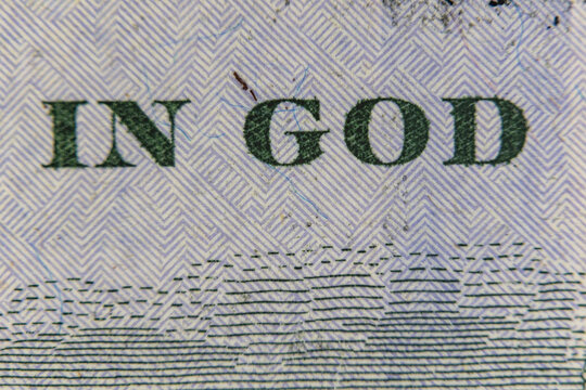 Extreme macro close up of microprinting typography and security pattern on US dollar banknote