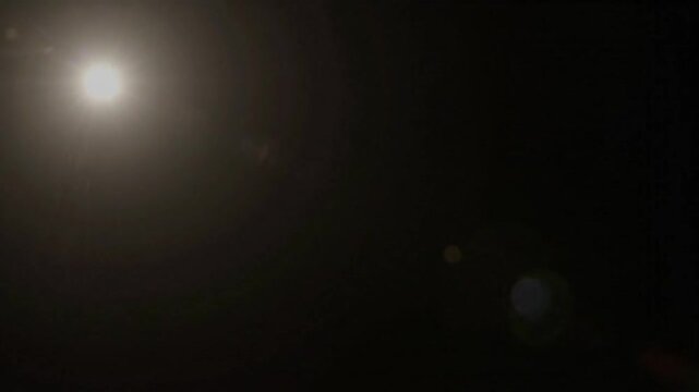 Optical lens flare light streak highlight bloom overlay background