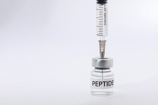 Medical peptide therapy syringe vial injection gives hopeful feeling for patient health recovery