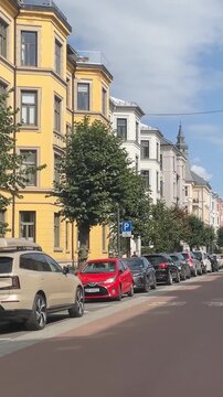 City streets and traditional architecture in the urban neighborhood of Frogner in Oslo, Norway. Vertical design in 9:16 ratio. Smartphone and social media ready.