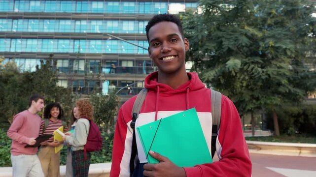 Happy african american student smiling on campus