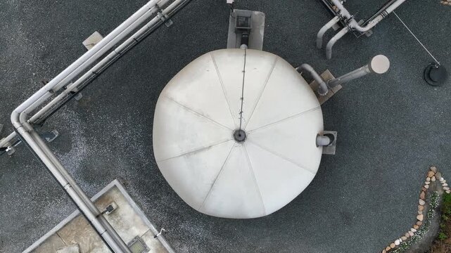 Aerial circles above membrane gas container in biogas production