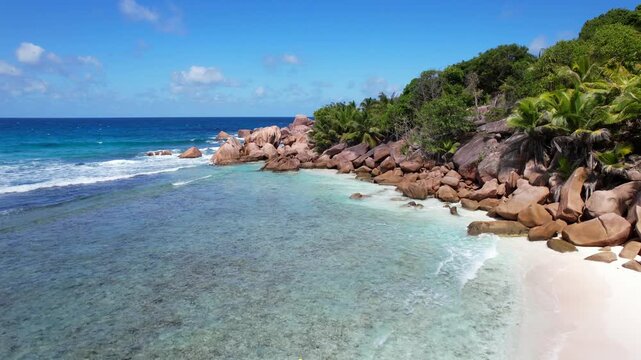Awesome Anse Cocos beach in la Digue island of Seychelles. Drone