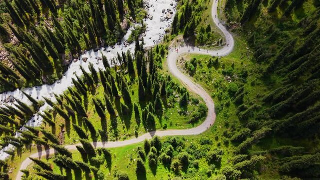 Cinematic drone panning up through the valley of Ala Kul in Kyrgyzstan