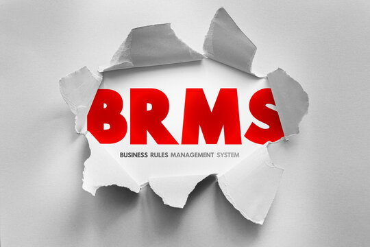 BRMS Business Rules Management System text under torn paper effect, enterprise technology concept for rule automation, decision control, workflow logic and operational governance