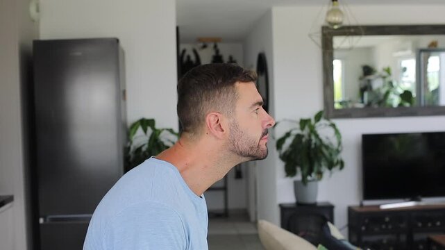 Man dramatically changing his back and neck posture