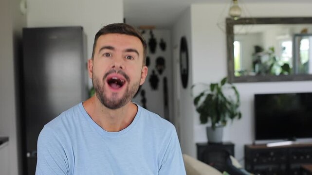 Man listening attentively before having a sudden realization 