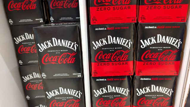 Leicester, England, UK - 15 August 2026: Jack Daniel's perfectly mixed with Coca-Cola alcoholic beverage canned four packs displayed on store shelf