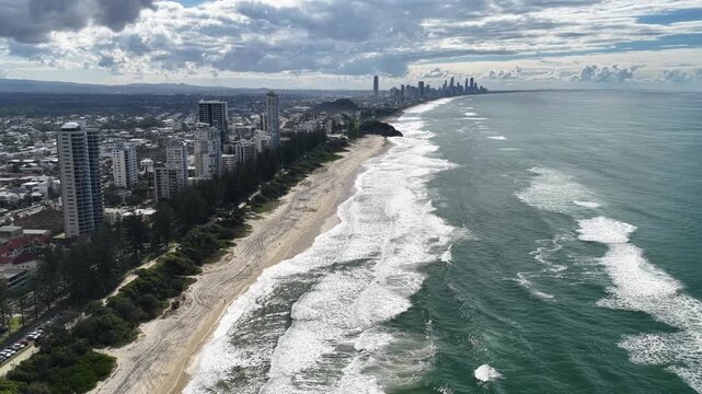 Aerial drone view of surf rolling onto Burleigh Heads beach, Gold Coast, Queensland Australia