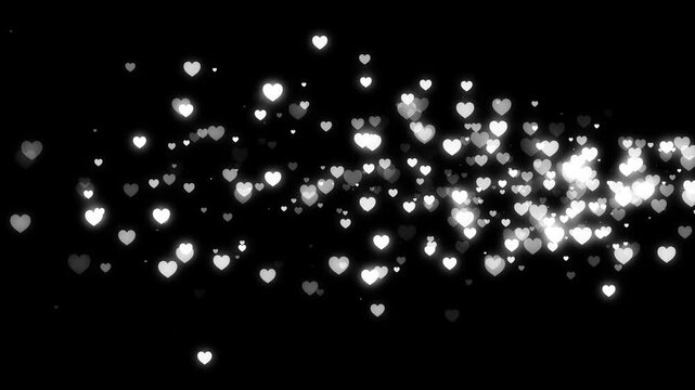 Glowing heart light trail with sparkling glitter particles, romantic valentine&rsquo;s day bokeh, shimmering love dust, wedding overlay motion background, seamless loop animation 4k