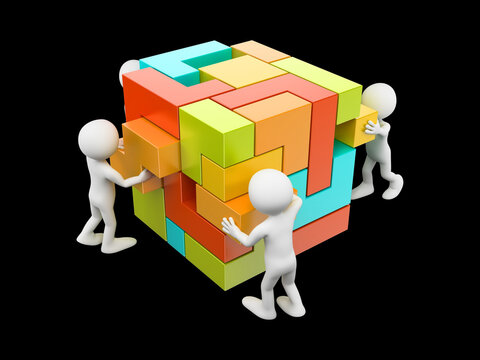 Small white human figures assemble a large colorful geometric cube puzzle with complex interlocking plastic blocks
