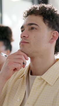 Listen, man and serious at business workshop for staff training, employee education and upskill. Insight, person and taking notes in crowd for career growth, seminar engagement and workplace learning