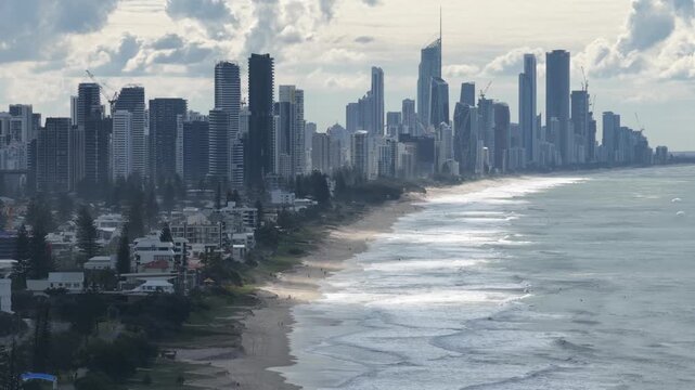 Burleigh Heads aerial drone footage over the point, beach and Surfers Paradise skyline, Gold Coast, Queensland Australia