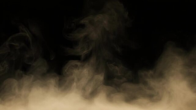 Dense swirling smoke or fog against a black background