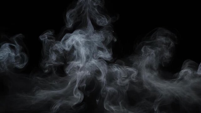 White smoke swirling against a black background