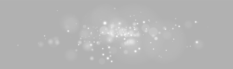 White glowing dust particles float softly on a dark background. Bright specks create an elegant luminous effect. Perfect for festive designs, overlays, magic scenes, and celebrations. © Ole moda
