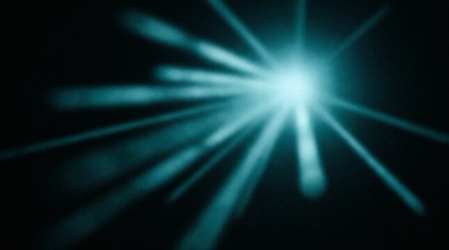 Abstract Teal Lens Flare With Radial Light Rays On Dark Background For Creative Digital Design And Cinematic Effects
