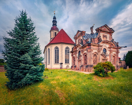 Splendid morning view of Kanitz Kyaw's Tomb and Ev - Luth protestant church. Impressive summer cityscape ov Hainewalde village, Saxony, district Gorlitz, Upper Lusatia, Germany, Europe. 