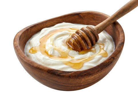 Bowl of fresh creamy yogurt with honey drizzle and wooden dipper isolated on transparent background