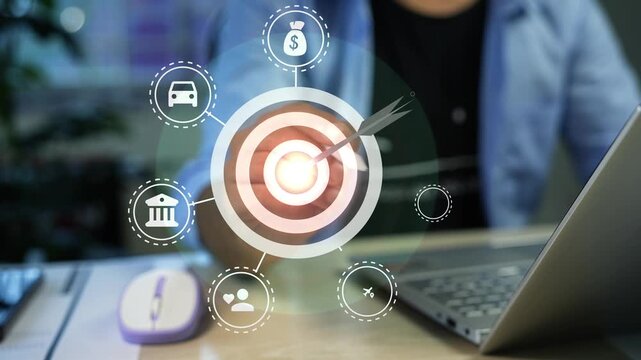 Businessman working on desk with clicking target holographic animation, Business strategy target with arrow on virtual interface