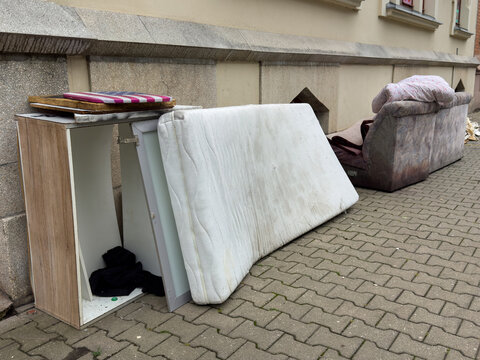 Apartment Clearance Furniture Awaiting Bulky Waste Collection on City Street