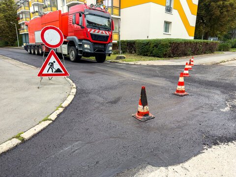 Fresh Black Asphalt Surface on Renovated City Road &ndash; Construction Site