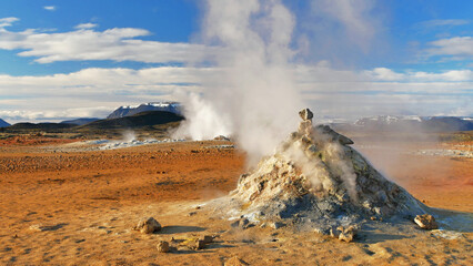 Volcanic orange landscape with gas exhausts in Iceland, beautiful wild scenery © pettys