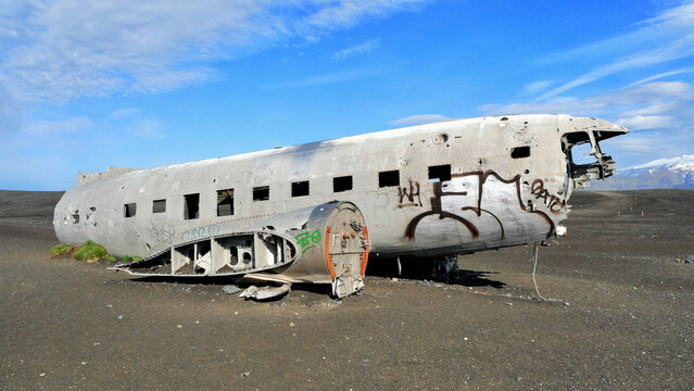 Airplane wreck on the beach in Iceland, abstract scene in landscape