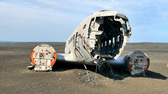 Airplane wreck on the beach in Iceland, abstract scene in landscape