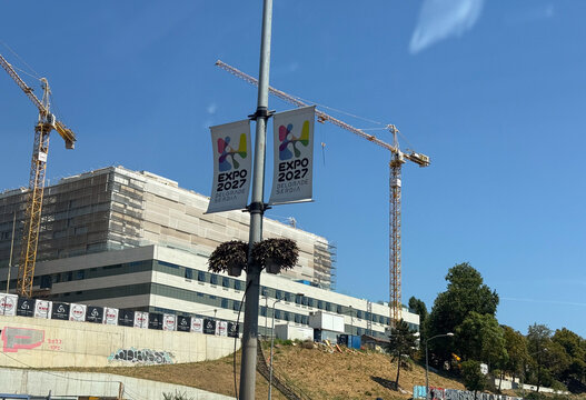 30 July 2026, Belgrade, Serbia: Expo 2027 banners line a busy Belgrade roadway beside cranes and renovation work as Serbia prepares for the international specialized exhibition.
