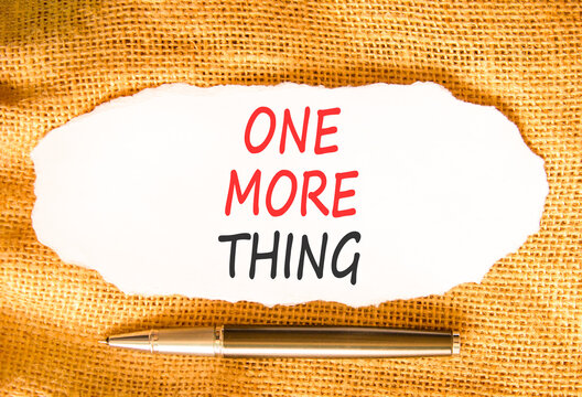 One more thing words symbol. Concept words One more thing on beautiful white paper. Beautiful canvas background. Black pen. Business and one more thing concept. Copy space.