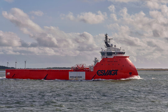 Offshore support vessel ESVAGT Heidi navigating the shipping channel in fan&oslash; Bugt near the Port of Esbjerg Denmark Maritime transportation and logistics industry commercial shipping and sea travel