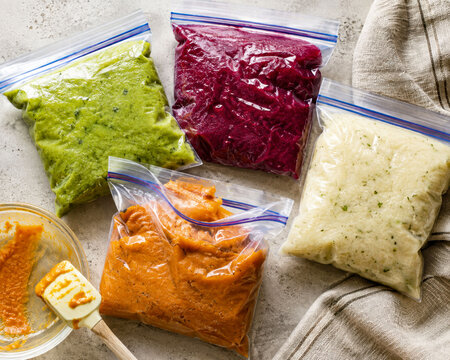 Colorful Homemade Vegetable Purees in Freezer Bags for Meal Prep and Food Storage
