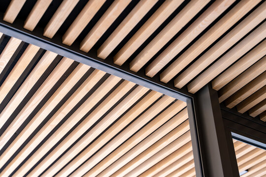 Wood slat ceiling with a black frame