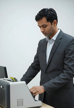 Financial transaction processing, man using a card reader machine for banking and payment services in a modern office