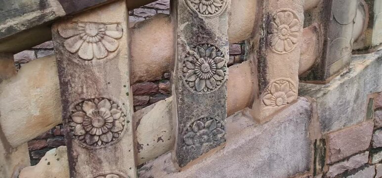 Weathered Bas Relief Stone Carvings and Decorative Wall Patterns at Sanchi Stupa Complex