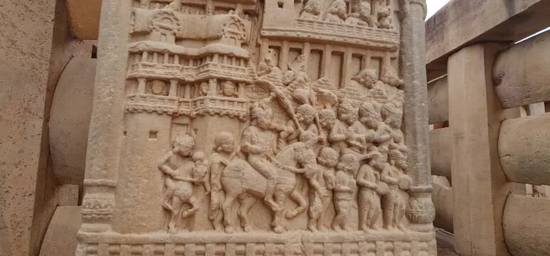Intricate Bas Relief Stone Carvings on Torana Gateway Beam at Historic Sanchi Stupa, Bhopal, Madhya Pradesh, India 