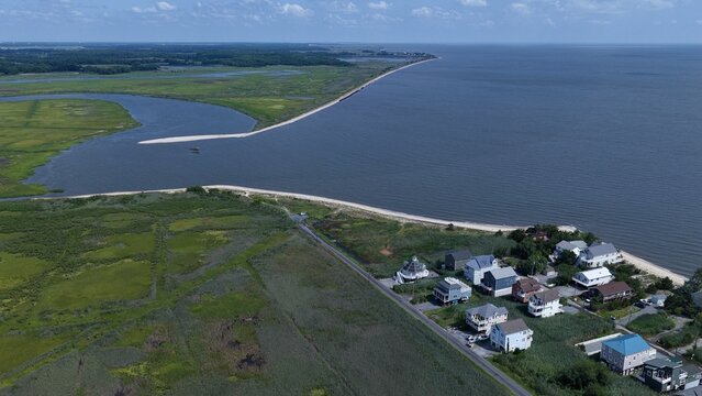 Residential Coastal Living Along Delaware coastline at Bowers Beach with tidal marshes and homes in small coastal community