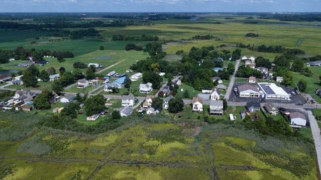 Residential Coastal Living Along Delaware coastline at Bowers Beach with tidal marshes and homes in small coastal community