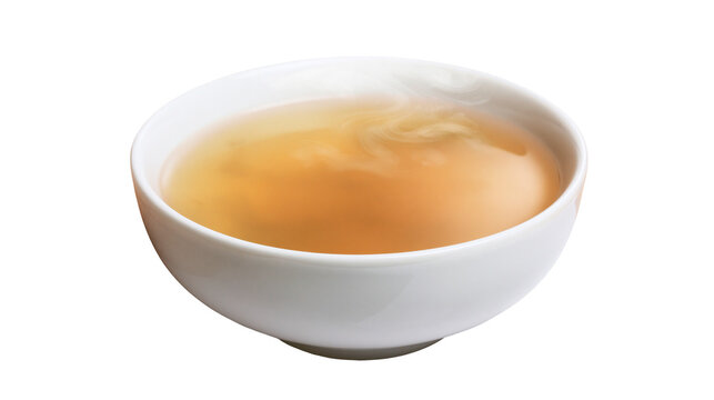 White bowl of clear golden broth with steam